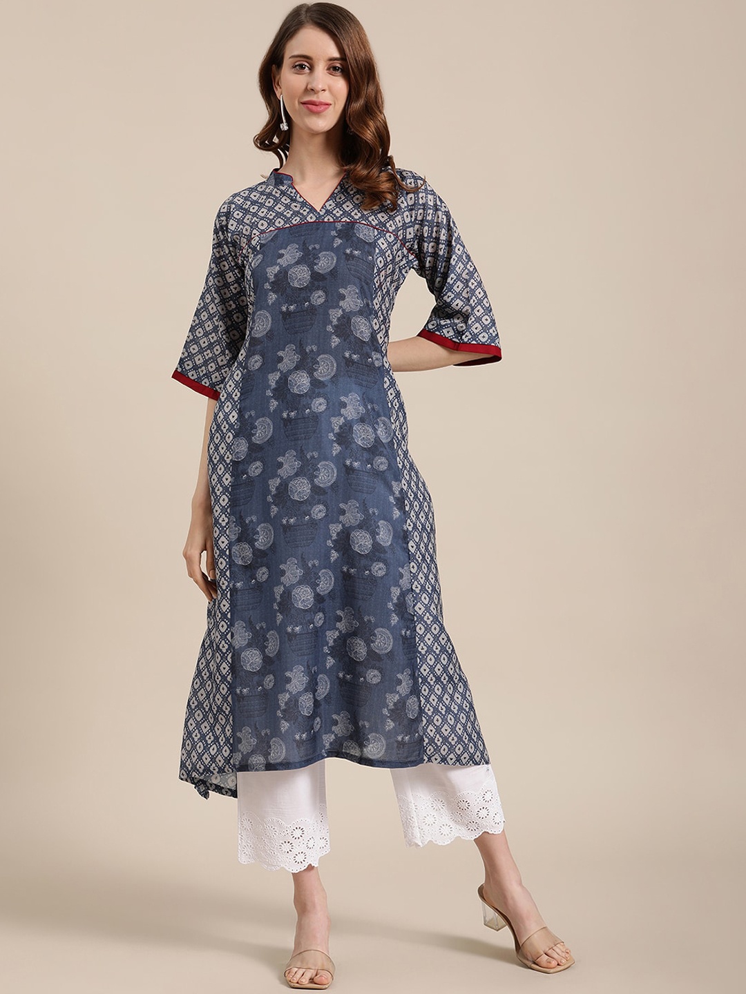 

Varanga Women Navy Blue Floral Printed Panelled Pure Silk Kurta with Palazzos