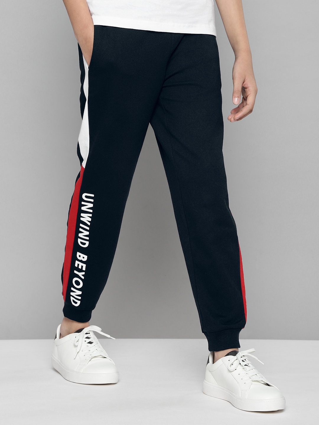 

M&H Juniors Boys Navy Blue Solid Joggers with Printed & Side Stripe Detail