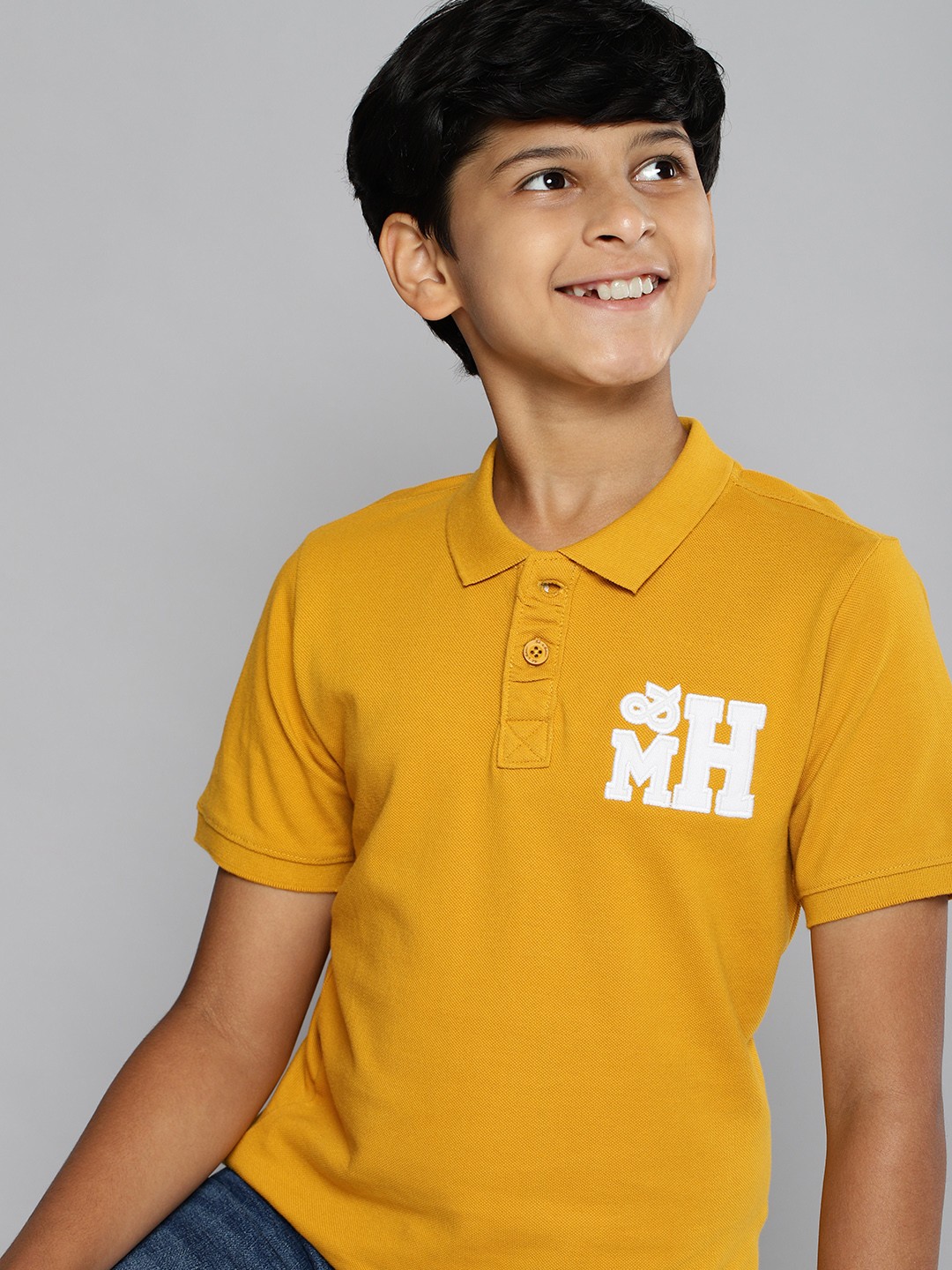 

MH Juniors Boys Mustard Yellow Pure Cotton Solid Polo Collar Applique Detail Pure Cotton T-shirt