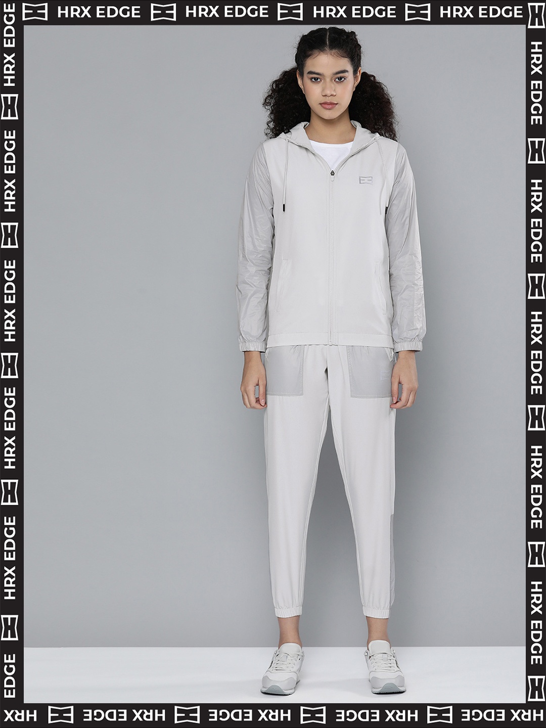 

HRX By Hrithik Roshan EDGE Lifestyle Women Dawn Blue Rapid-Dry Solid Tracksuits