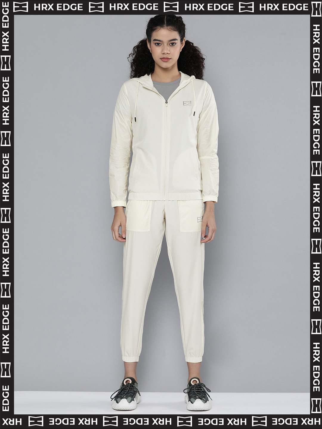 

HRX By Hrithik Roshan EDGE Lifestyle Women Natural Tan Rapid-Dry Solid Tracksuits, Yellow