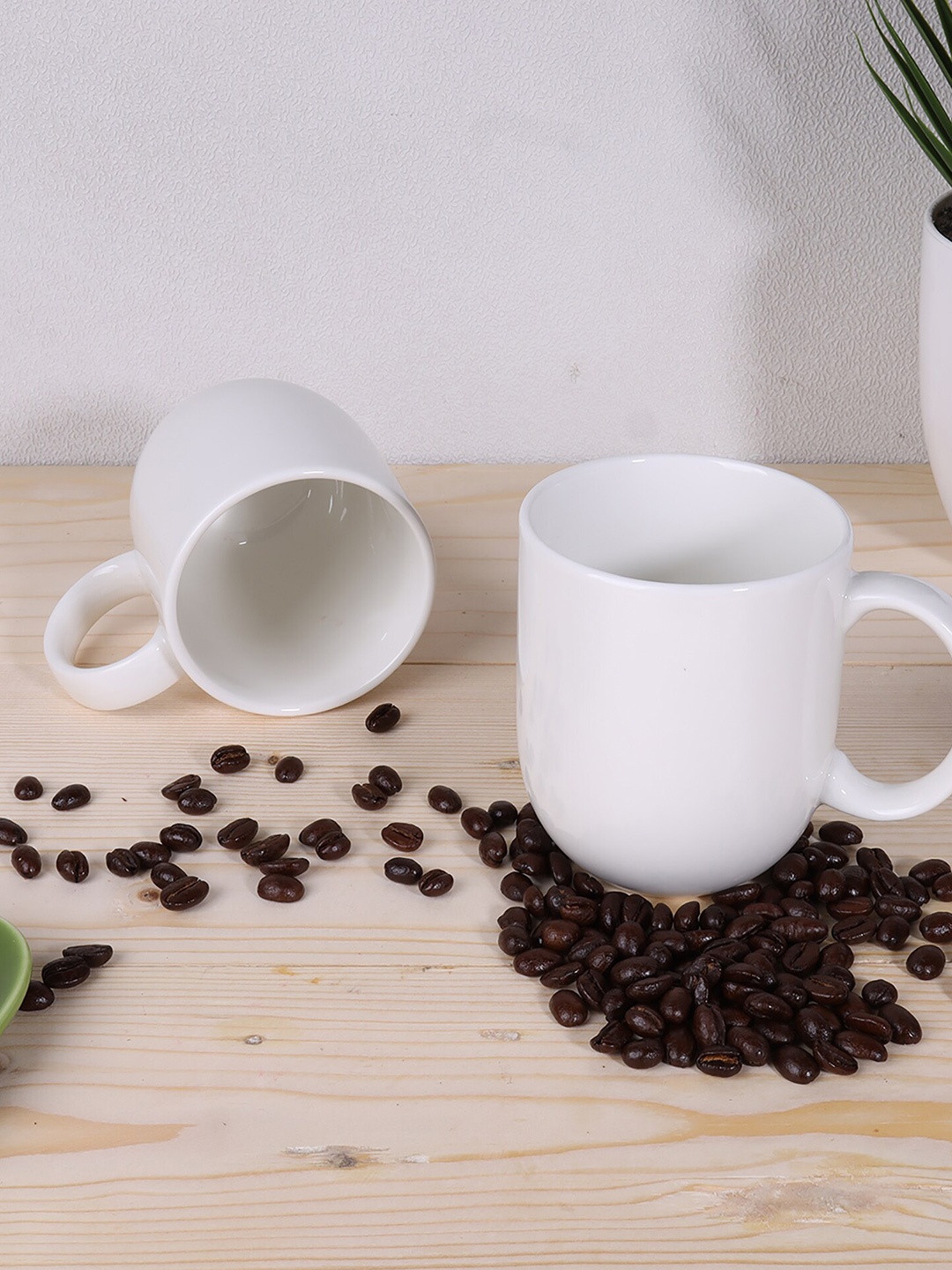 

Ariane Set Of 2 White Handcrafted Porcelain Glossy Mugs Coupe Cups