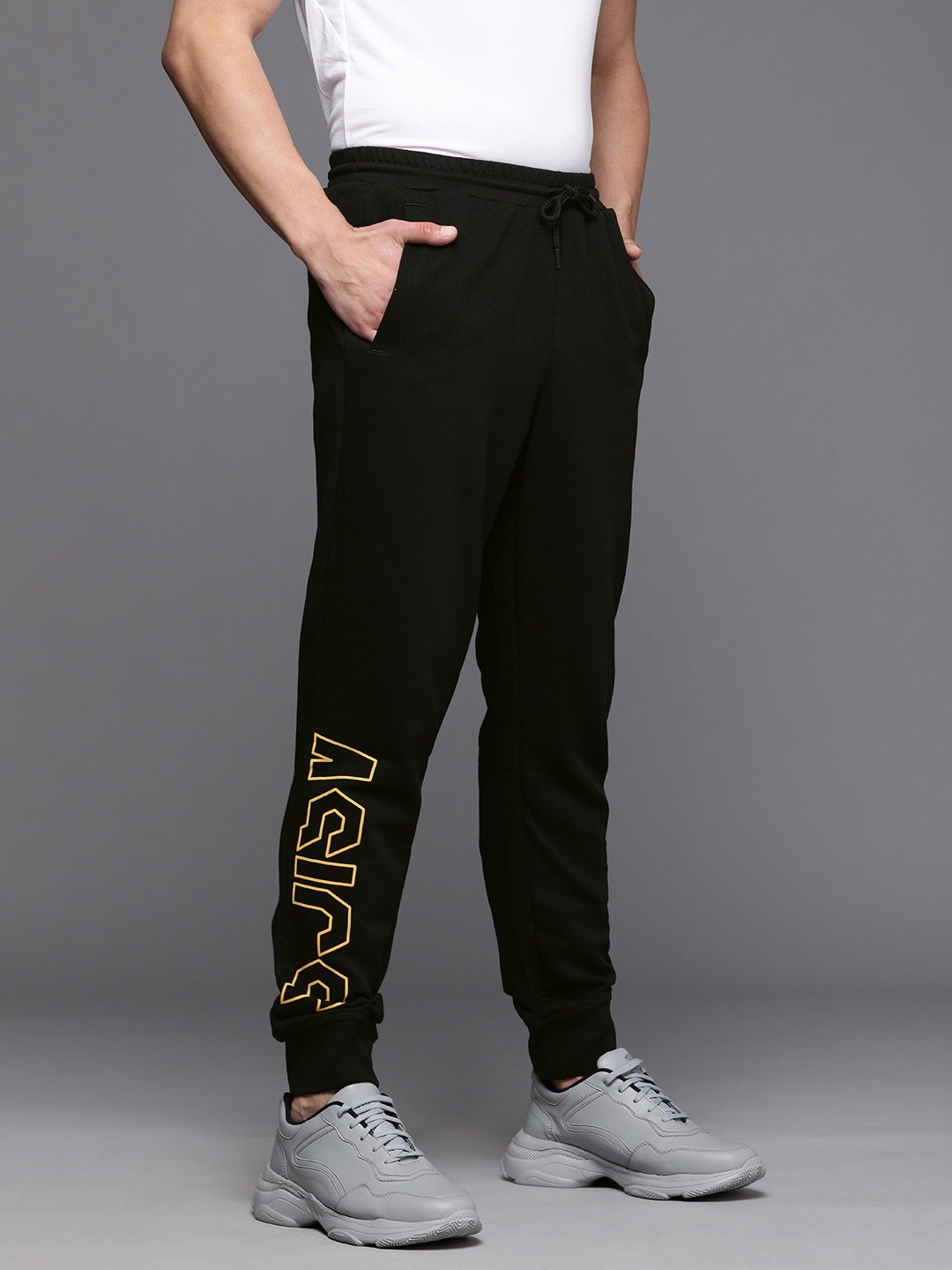 

ASICS Men Black & Yellow Printed Big Graphic Training Joggers