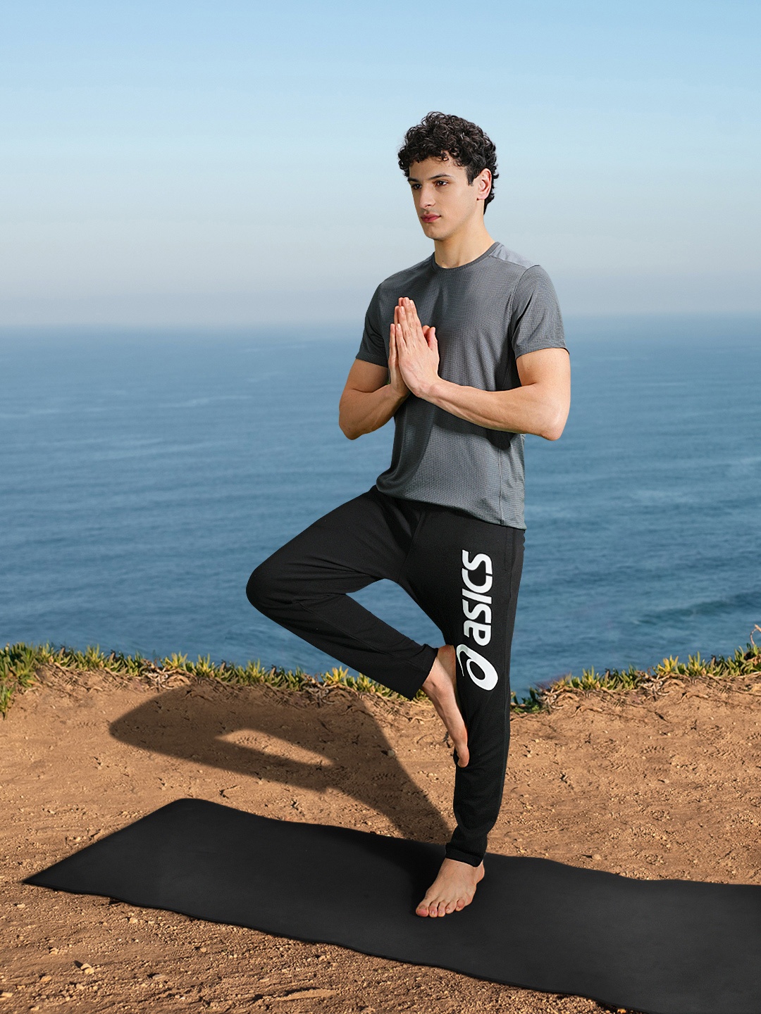 

ASICS Men Black Brand Logo Printed Slim Fit Big Graphic Regular Running Track Pants