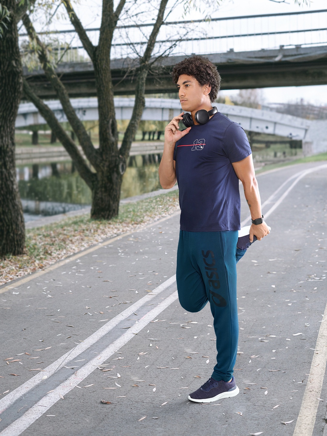 

ASICS Men Teal Blue Brand Logo Printed Mid-Rise Slim Fit Big Graphic Regular Running Track Pants