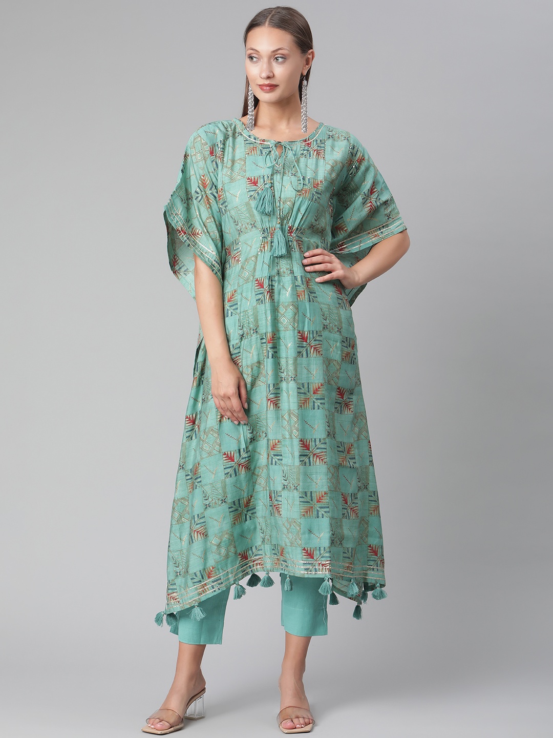 

Divena Abstract Viscose Rayon Kurta Set, Turquoise blue