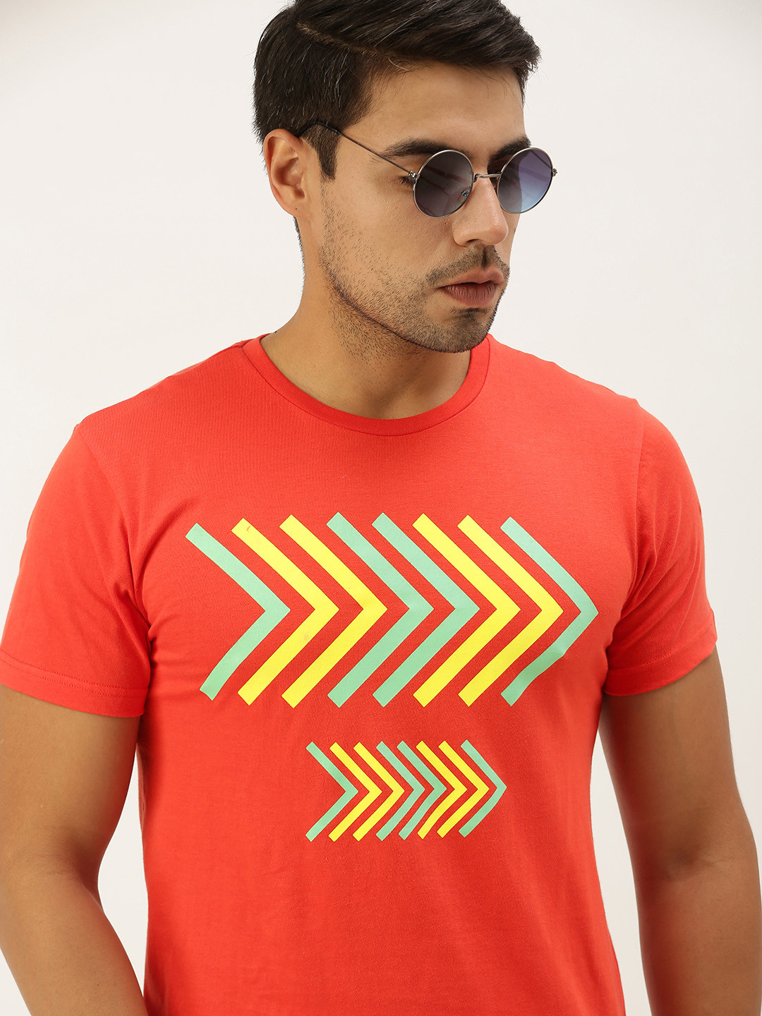 

Peter England Men Rust Orange Yellow Printed Pure Cotton T-shirt