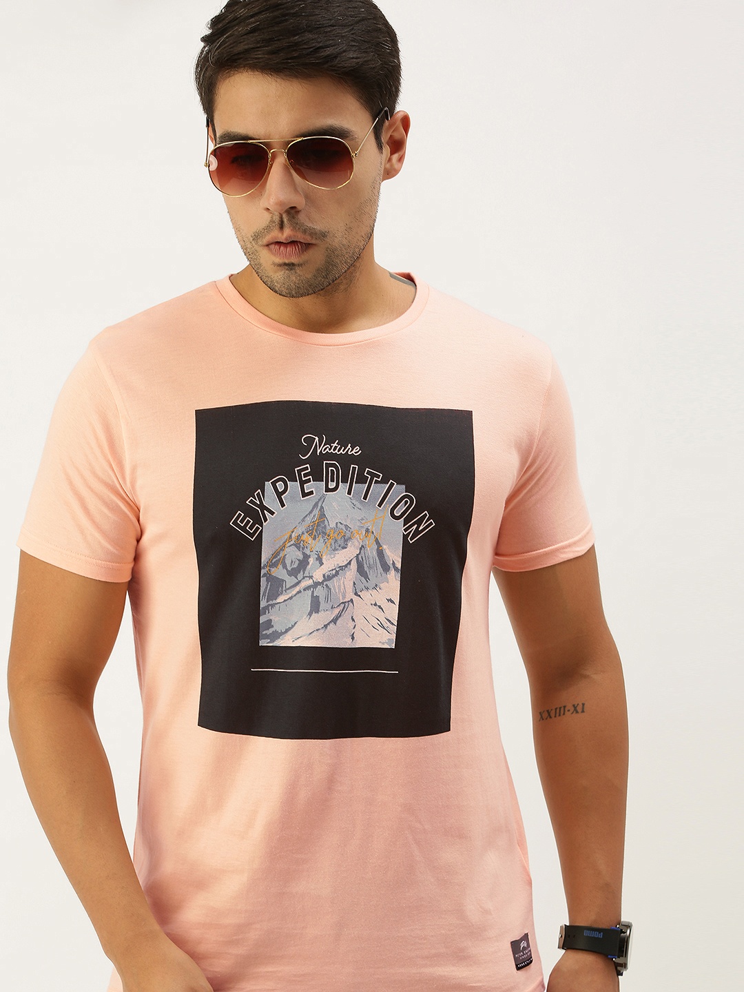 

Peter England Men Peach-Coloured Black Graphic Printed Pure Cotton T-shirt