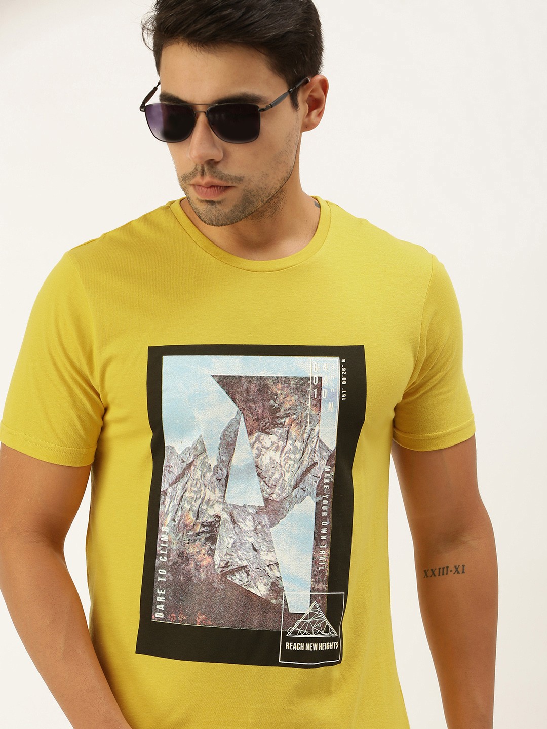 

Peter England Men Yellow Printed Slim Fit Pure Cotton T-shirt