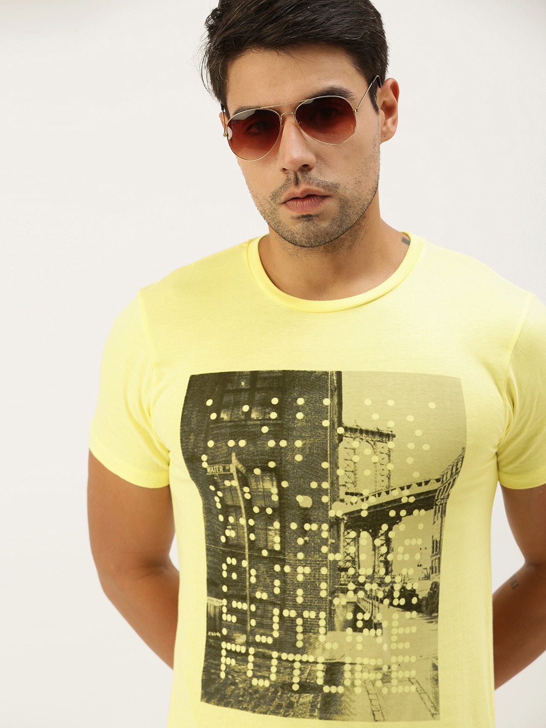 

Peter England Men Yellow Black Graphic Printed Pure Cotton T-shirt