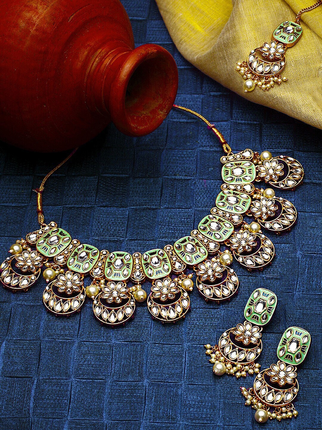 

Yellow Chimes Women Gold-Toned & Green Kundan Studded Meenakari Handcrafted Jewellery Set