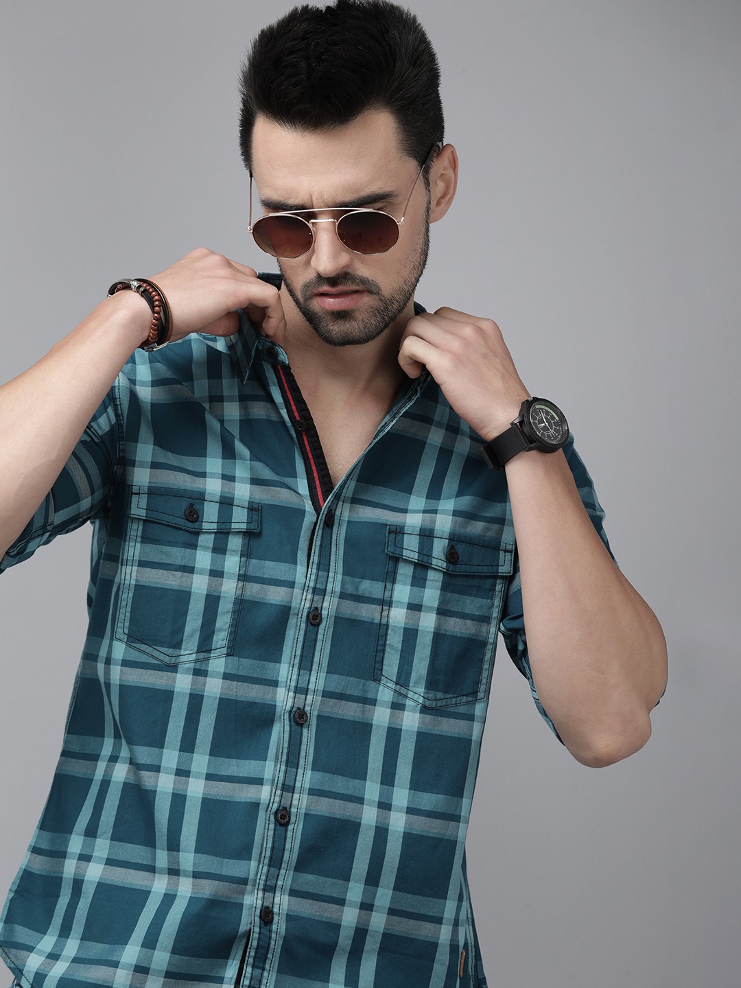 

The Roadster Lifestyle Co Men Blue Checked Casual Shirt