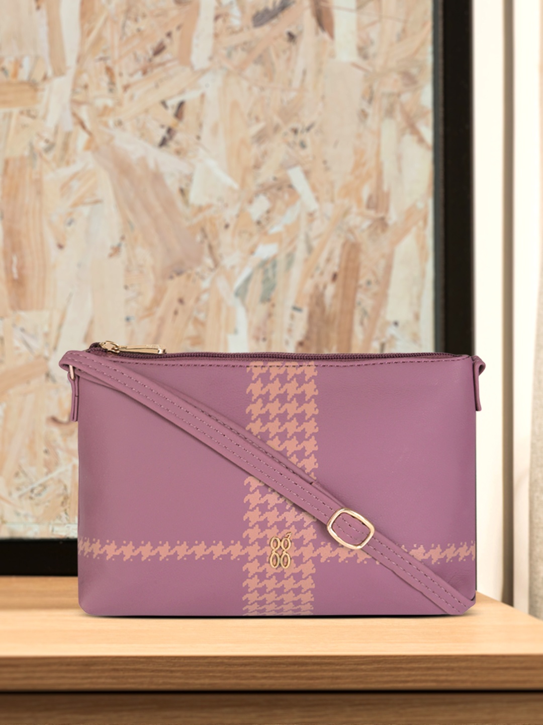 

Baggit Women Violet Printed Sling Bag