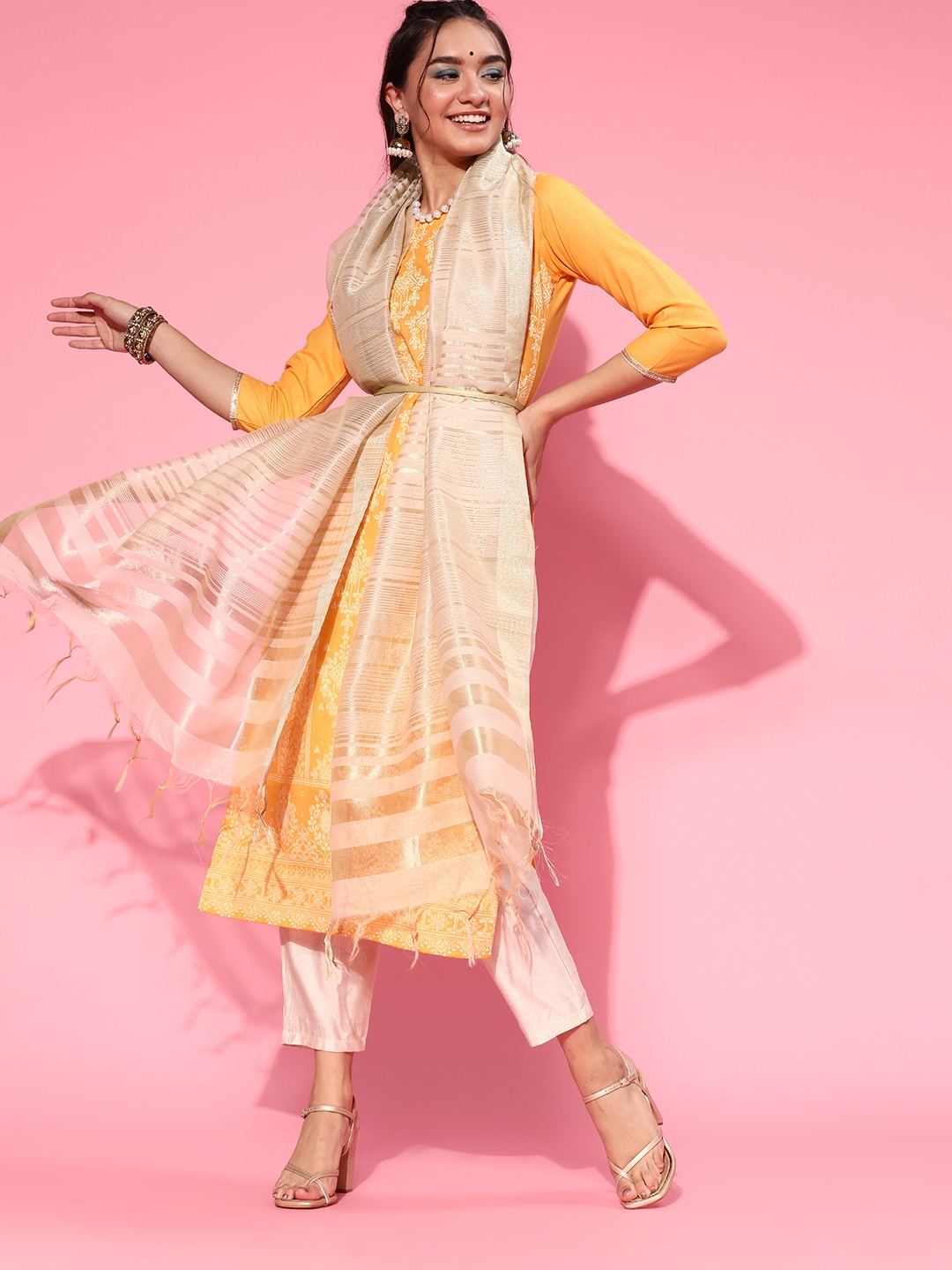 

Indo Era Women Orange Floral Embroidered Regular Chanderi Silk Kurta with Trousers & With Dupatta