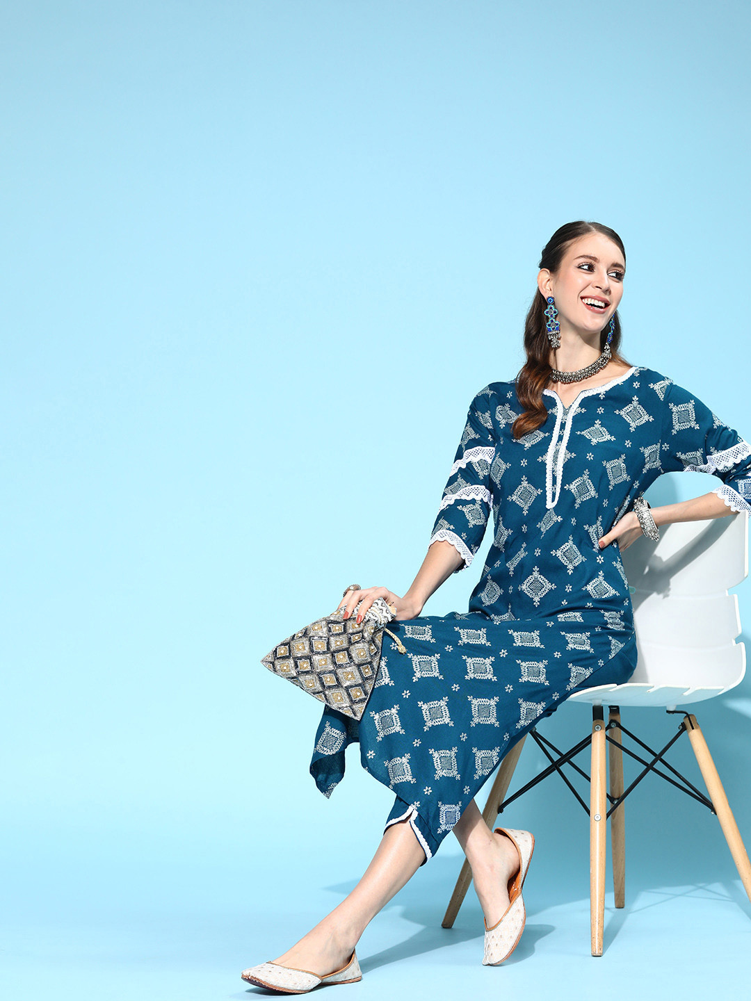 

Indo Era Women Blue & White Printed Patchwork Kurta with Palazzos