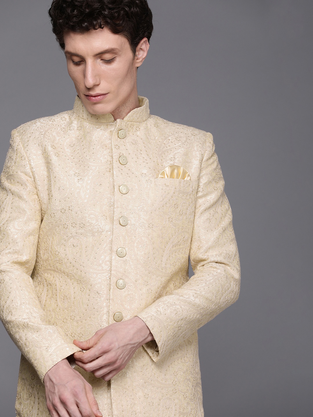 

Manyavar Men Beige Woven Design Sherwani & Churidar
