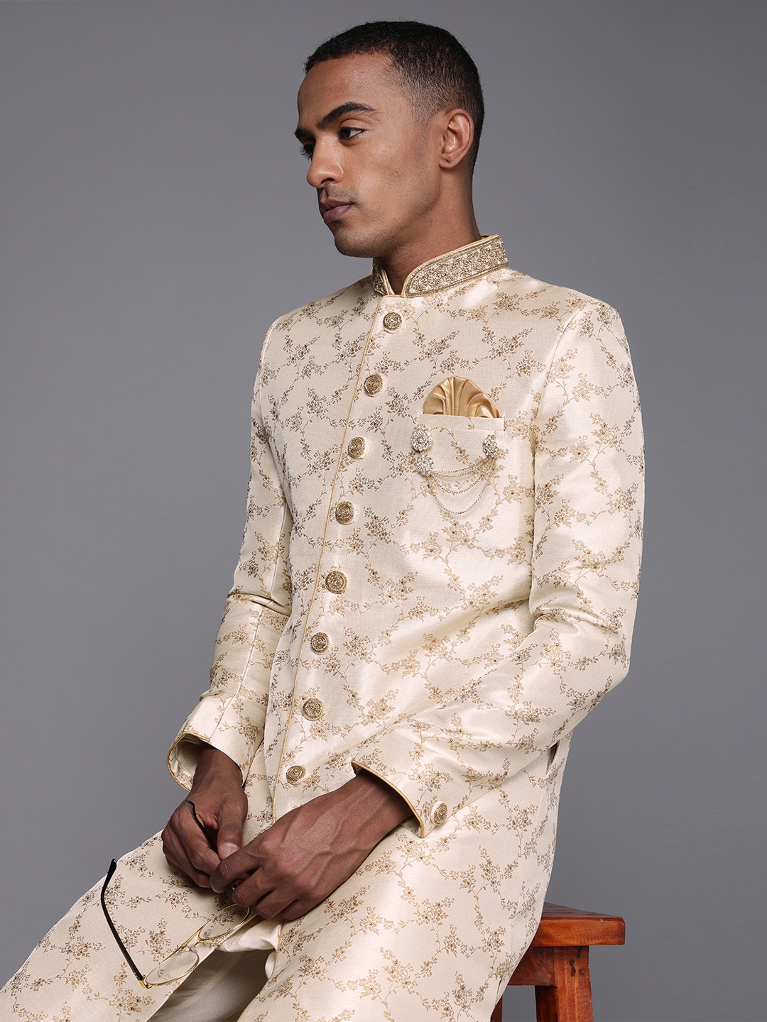 

Manyavar Men Beige Floral Printed Sherwani and Churidar Set