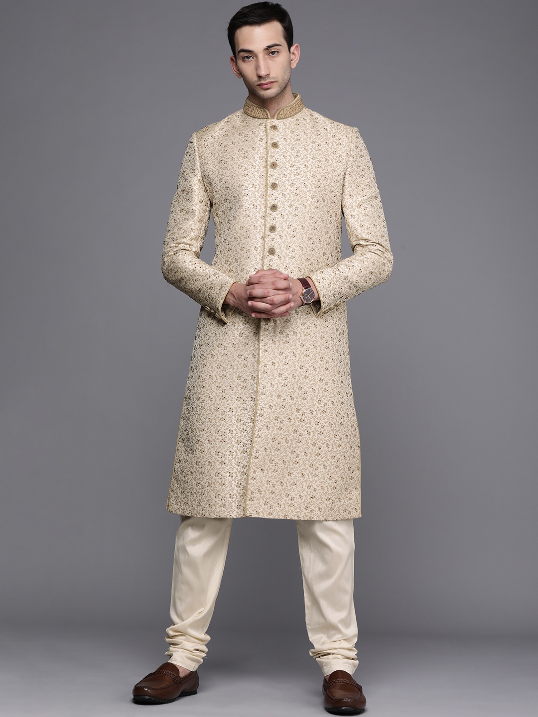 

Manyavar Men Beige Floral Embroidered Sherwani and Churidar Set