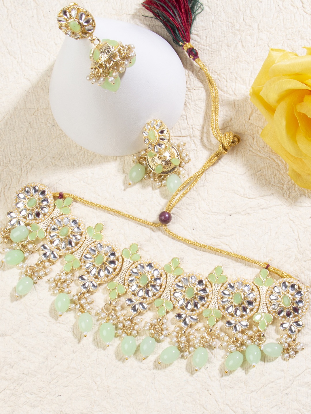 

AccessHer Bright Green & White Gold-Plated Kundan-Studded & Beaded Jewellery Set