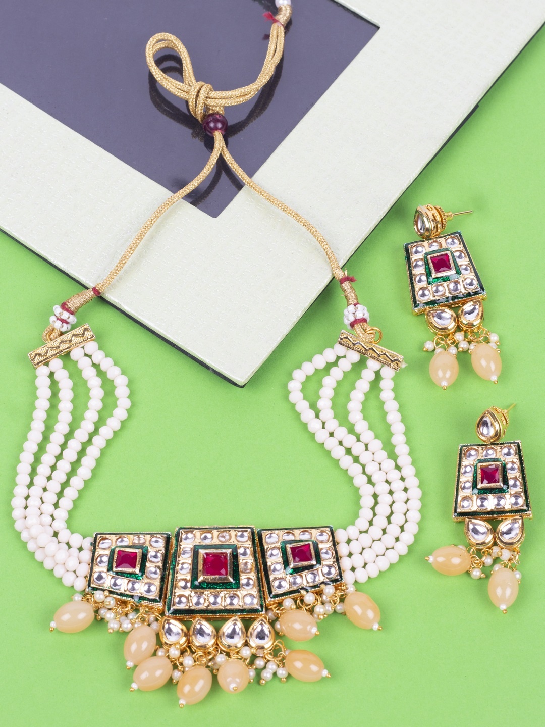 

AccessHer White & Cream-Coloured Gold-Plated Kundan-Studded & Beaded Jewellery Set