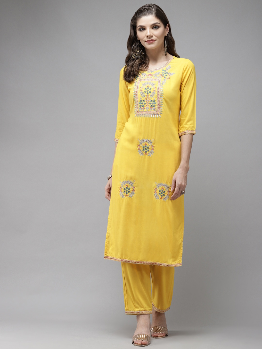 

Anubhutee Women Yellow Ethnic Motifs Embroidered Regular Kurta with Trousers
