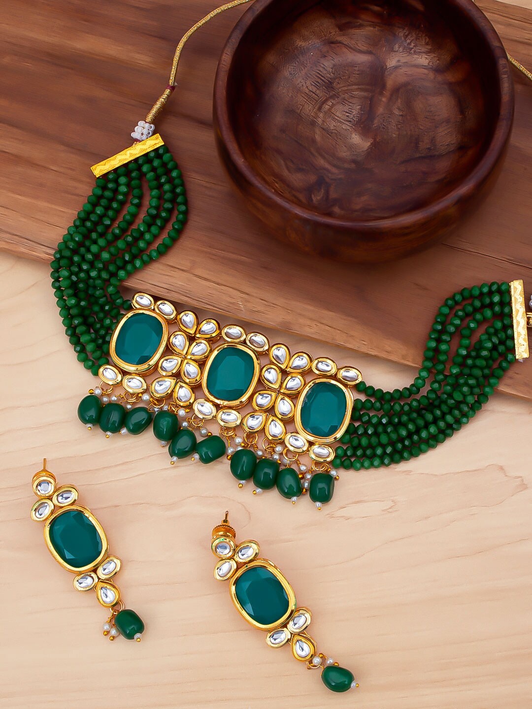 

Sukkhi Gold-Plated White & Green Kundan-Studded & Beaded Jewellery Set