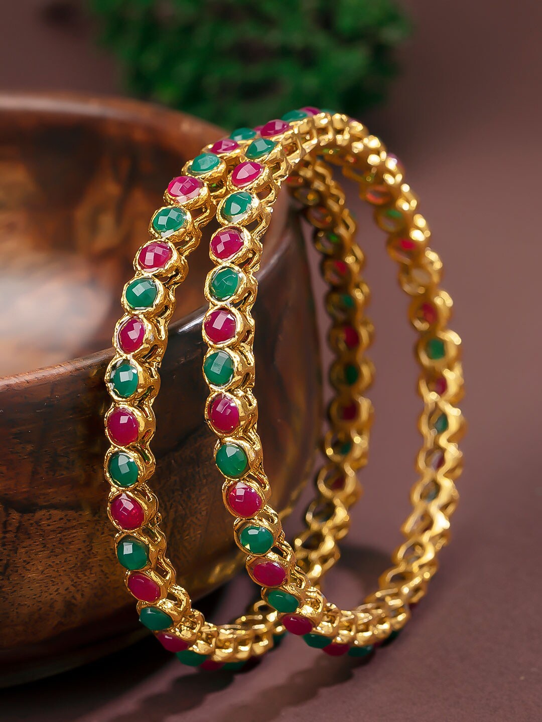 

Sukkhi Pretty Women Set Of 2 Artificial Stones Studded Gold Plated Bangles