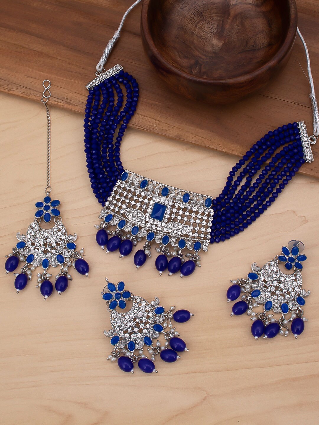 

Sukkhi Rhodium-Plated Blue & White Pearl-Studded & Beaded Choker Jewellery Set