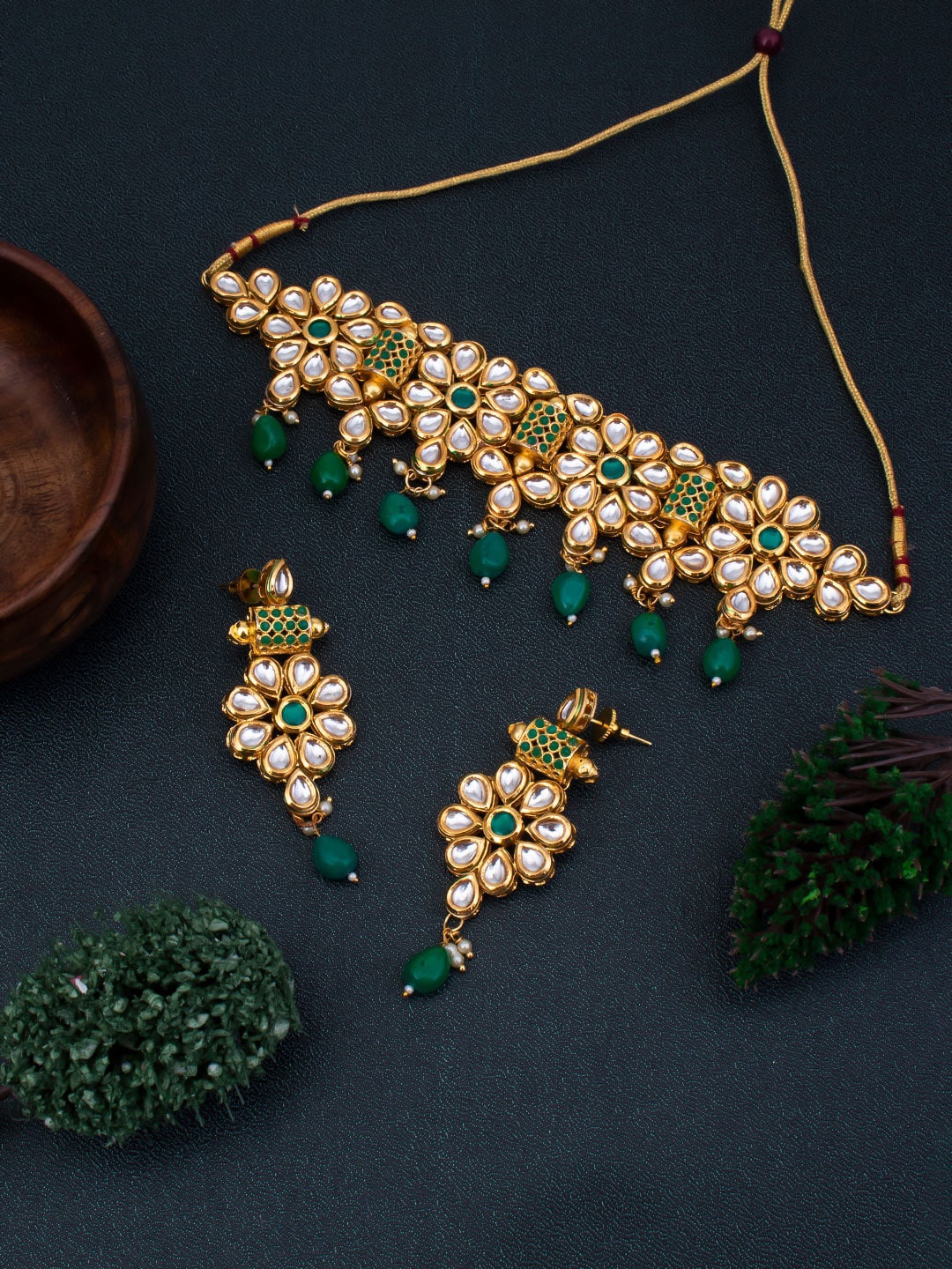 

Sukkhi Gold-Plated White & Green Kundan-Studded & Beaded Jewellery Set
