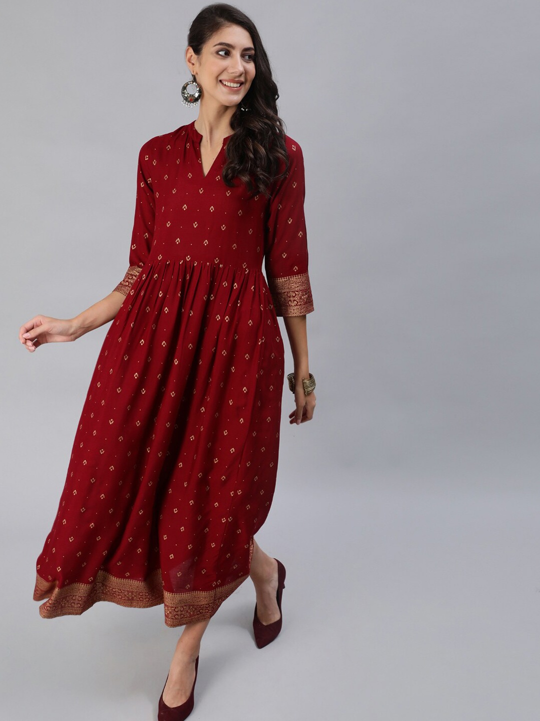 

Nayo Maroon & Gold-Coloured Ethnic Motifs Printed Ethnic A-Line Maxi Dress