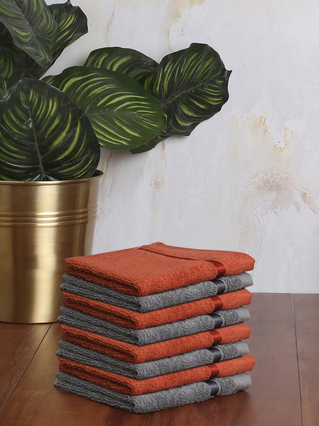 

SPACES Set Of 8 Solid 500 GSM Pure Cotton Face Towels, Orange