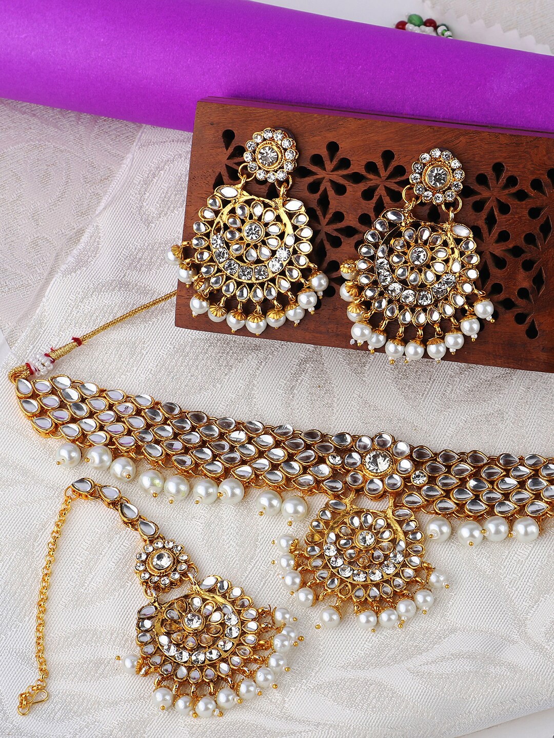 

ANIKAS CREATION Gold-Plated White Stone-Studded & Beaded Handcrafted Jewellery Set