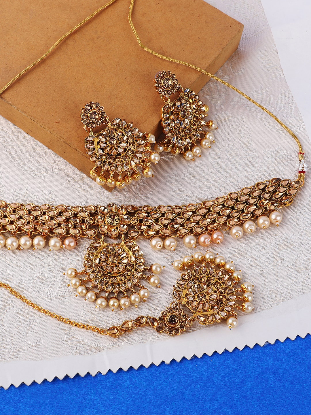 

ANIKAS CREATION Gold-Plated Beige & Cream-Coloured Stone-Studded & Beaded Jewellery Set