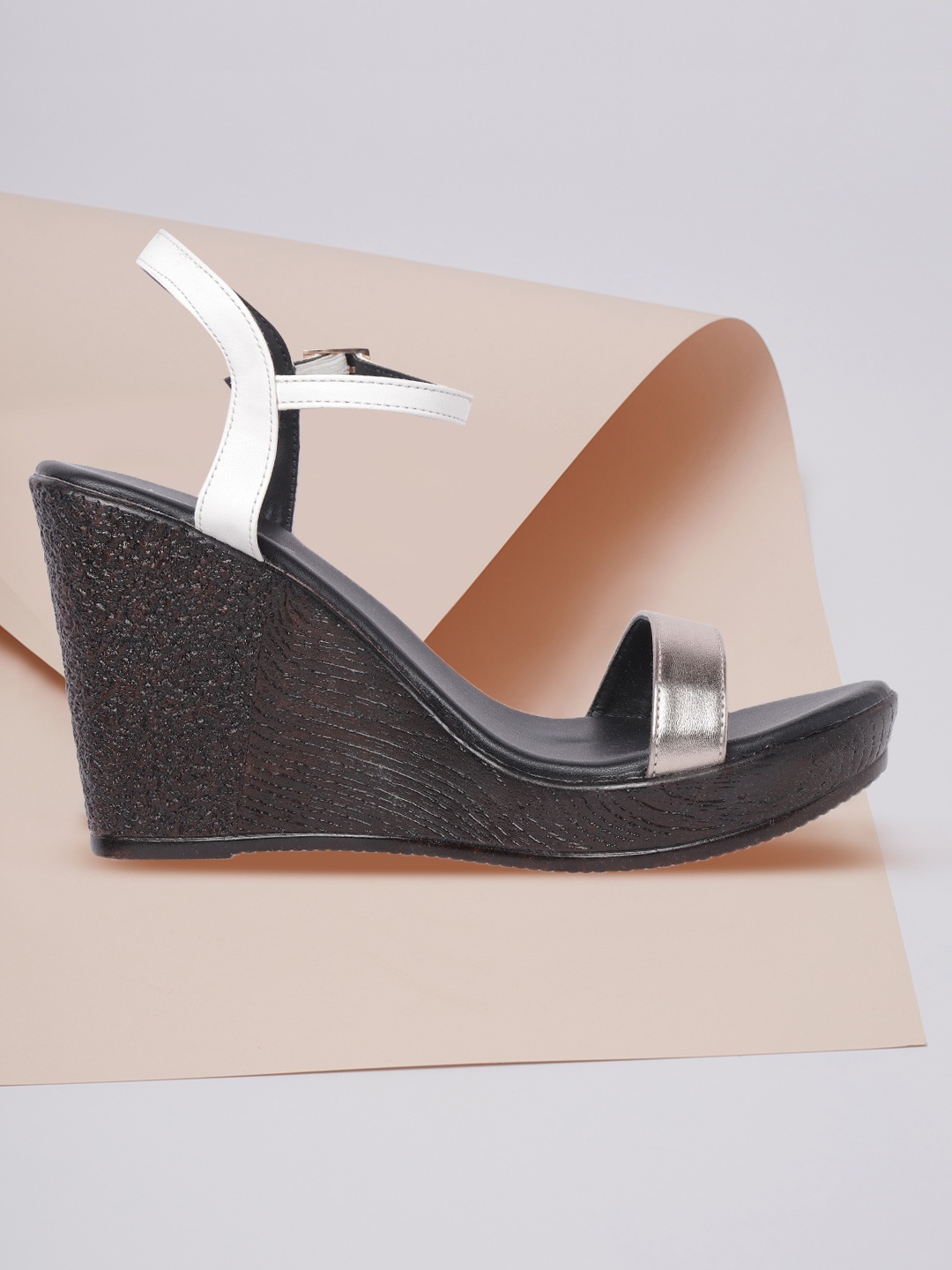 

DressBerry Women Gold-Toned & White Solid Wedges