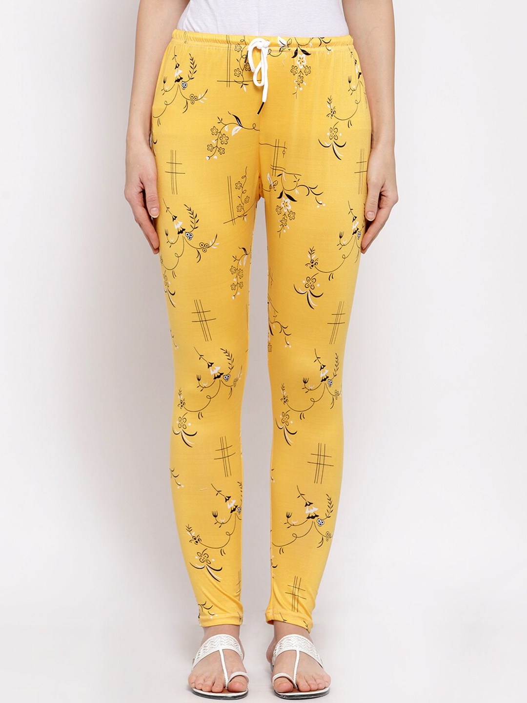 

Klotthe Women Yellow & Black Printed Mid Rise Trousers