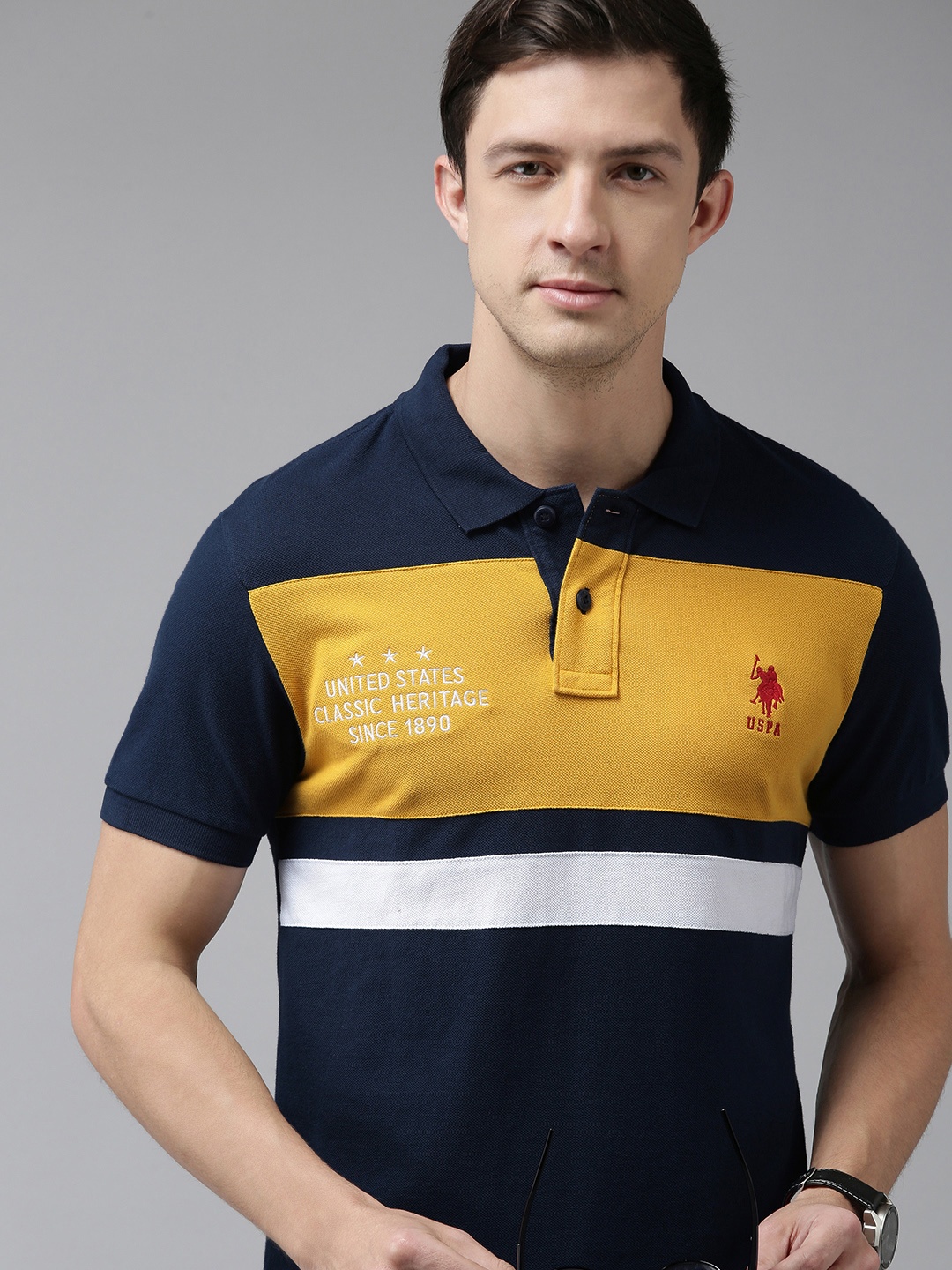 

U S Polo Assn Men Navy Blue & Mustard Yellow Colourblocked Polo Collar Slim Fit T-shirt