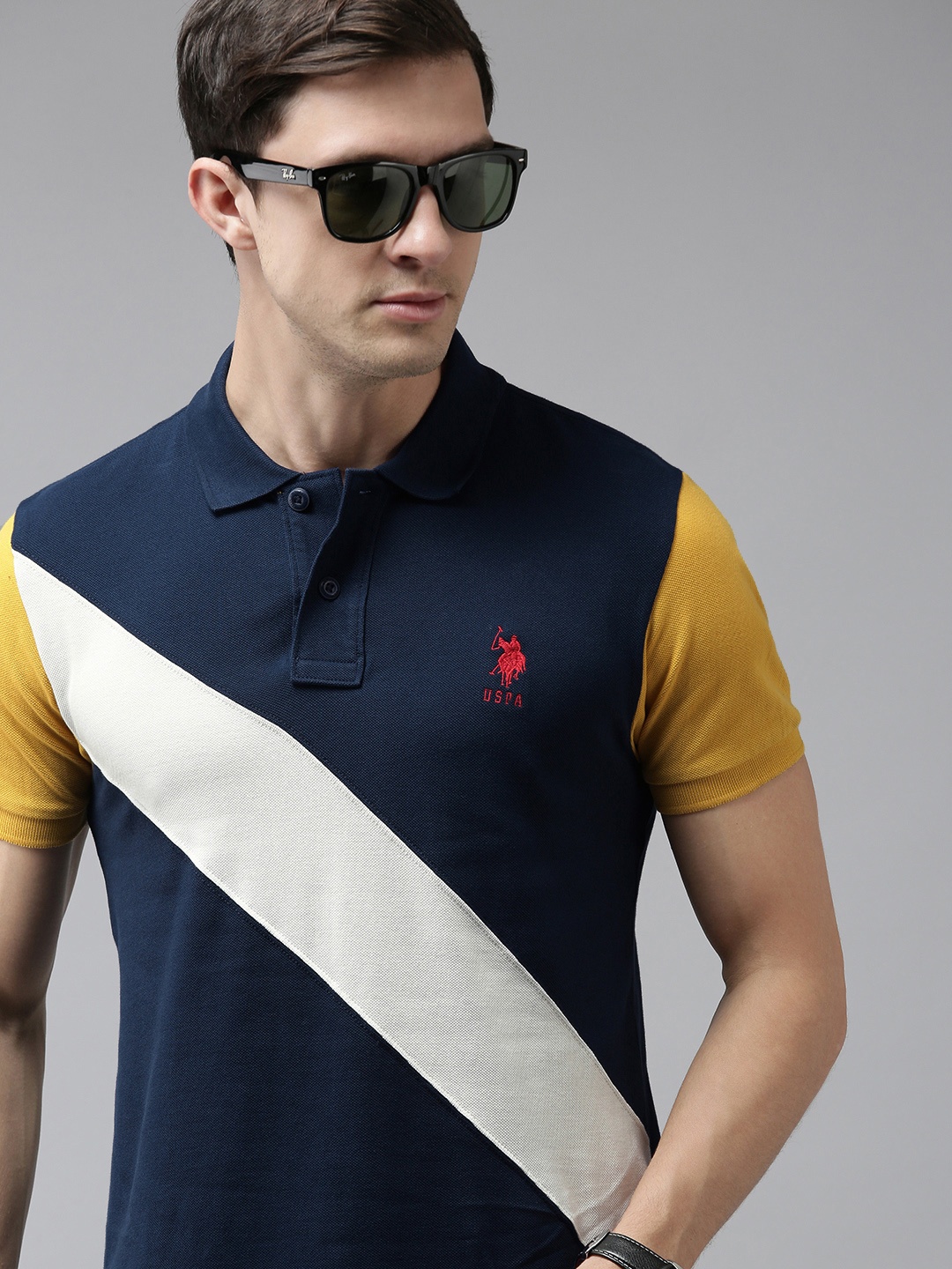 

U S Polo Assn Men Navy Blue & Mustard Yellow Colourblocked Polo Collar Slim Fit T-shirt