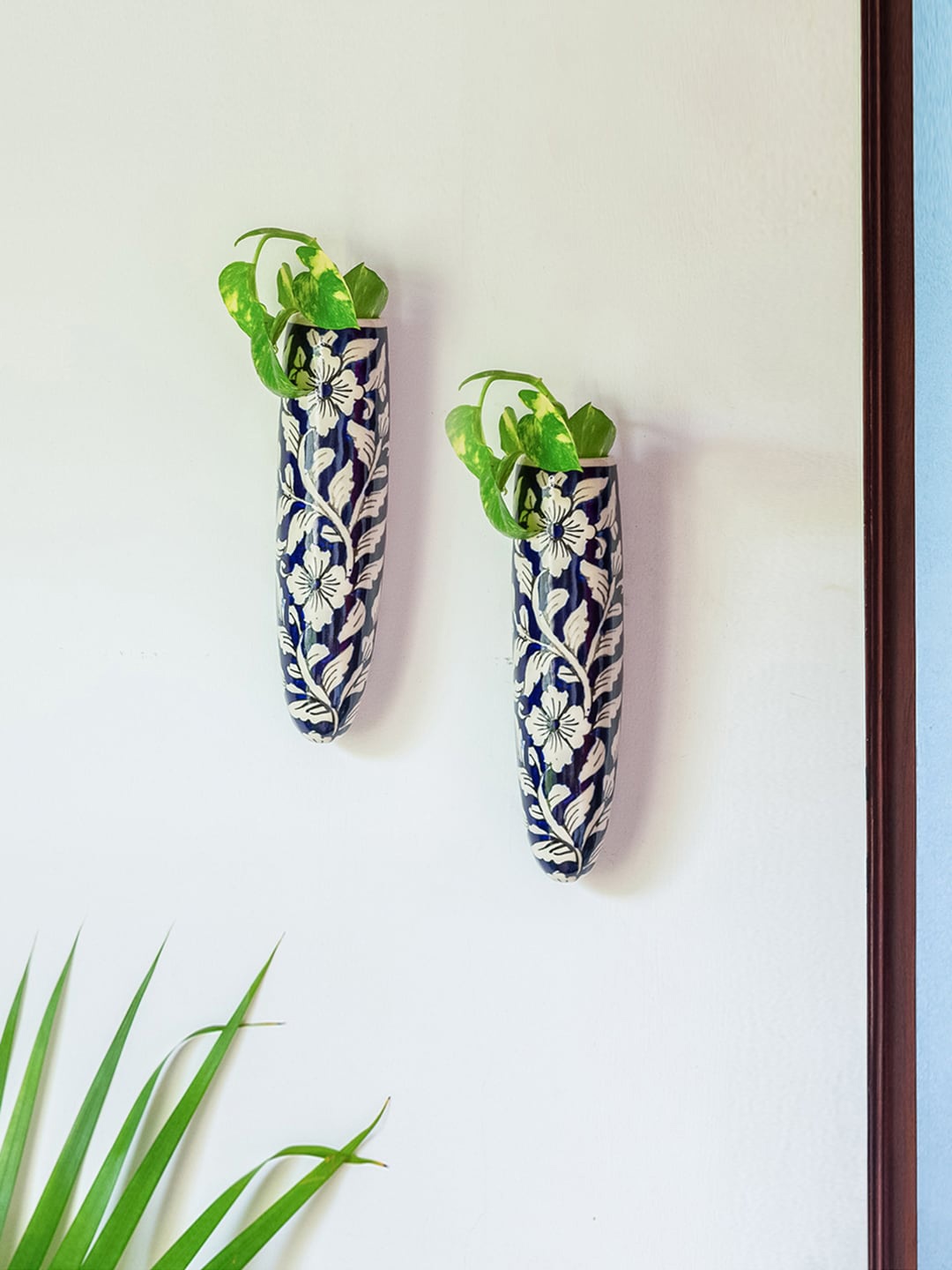 

ExclusiveLane Blue & White 2 Pieces Floral Ceramic Wall Planters