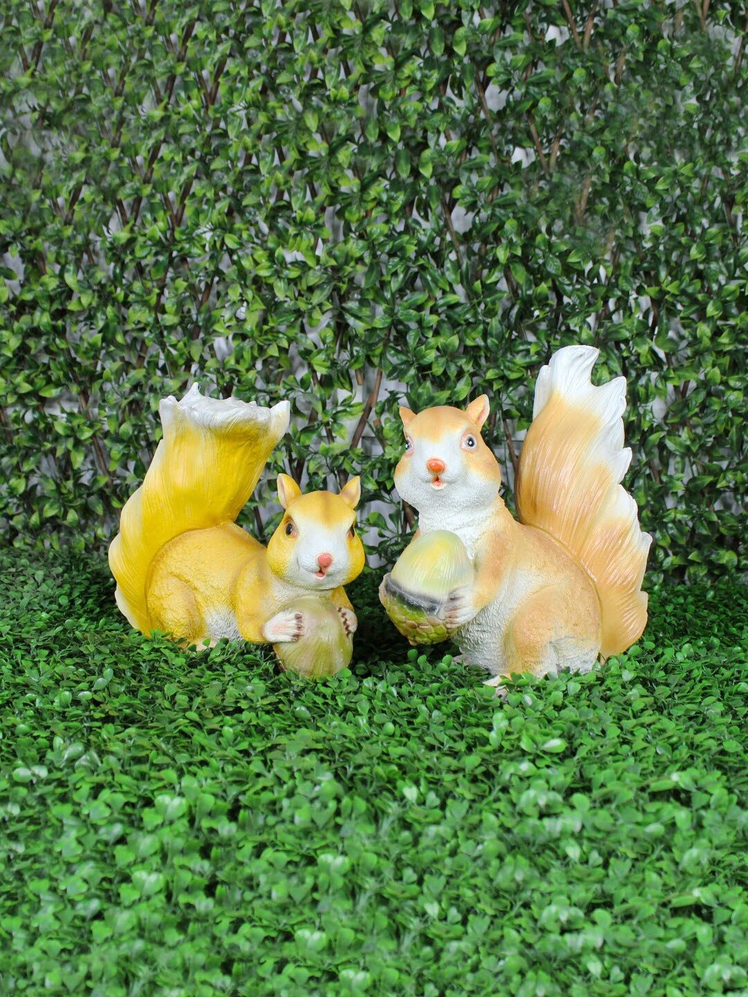 

Wonderland Set of 2 Yellow & Brown Resin Squirrel statues Garden Accessory