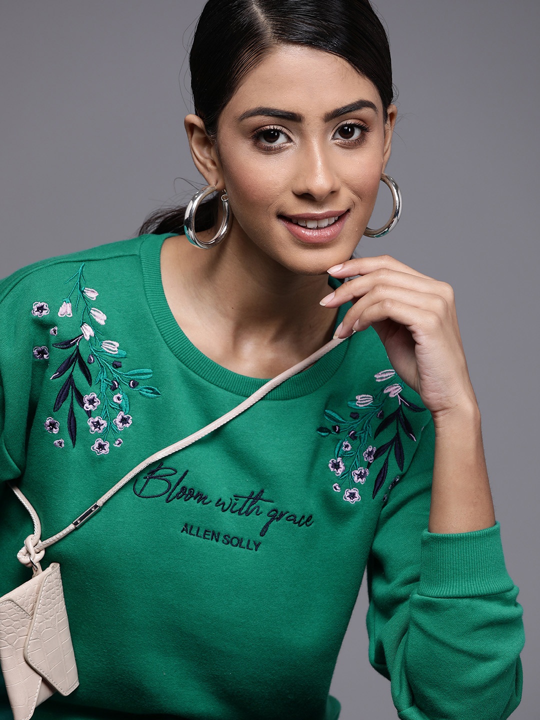 

Allen Solly Woman Green & Navy Blue Embroidered Sweatshirt