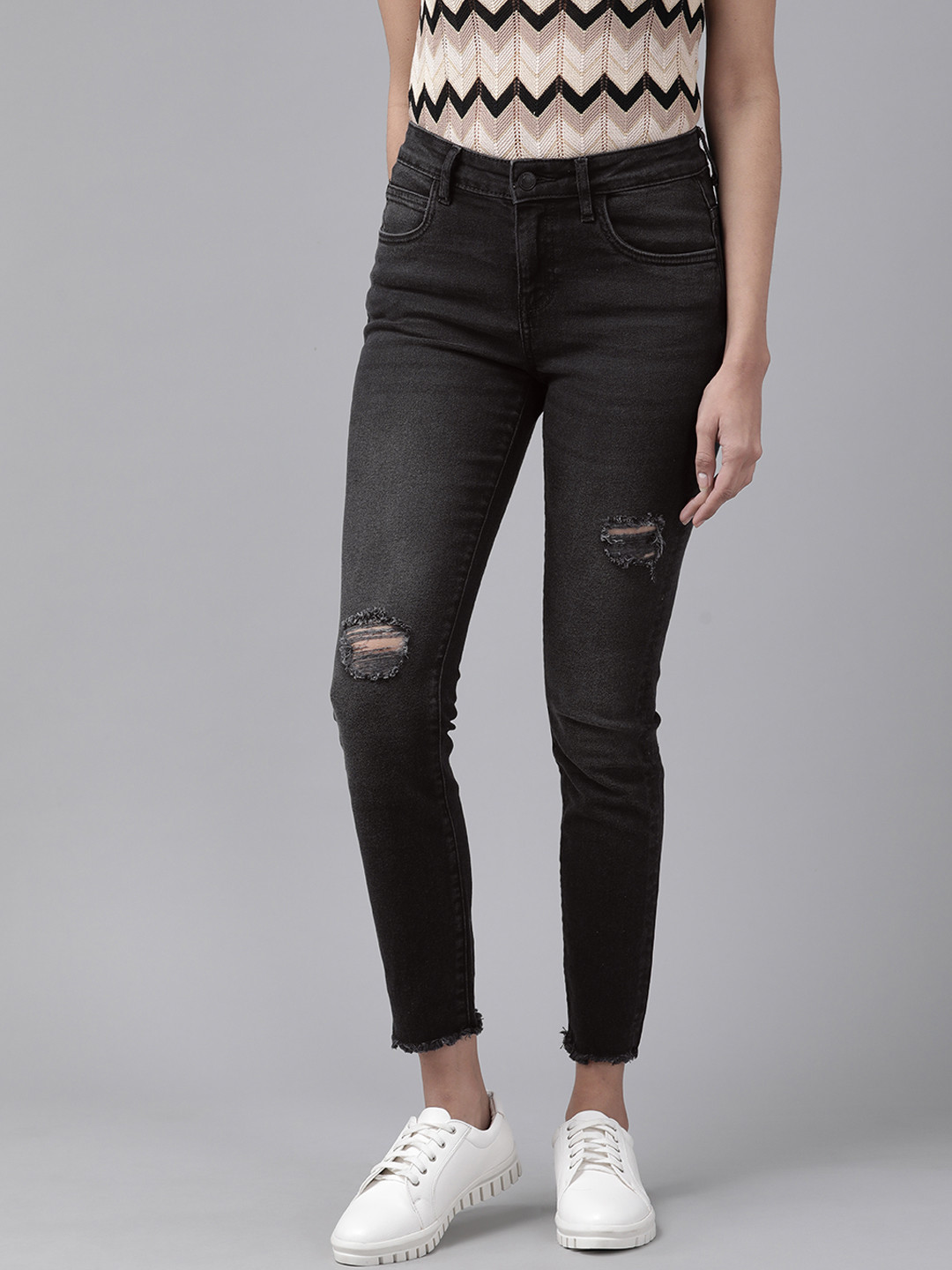 

Vero Moda Women Black Skinny Fit High-Rise Mildly Distressed Light Fade Stretchable Jeans
