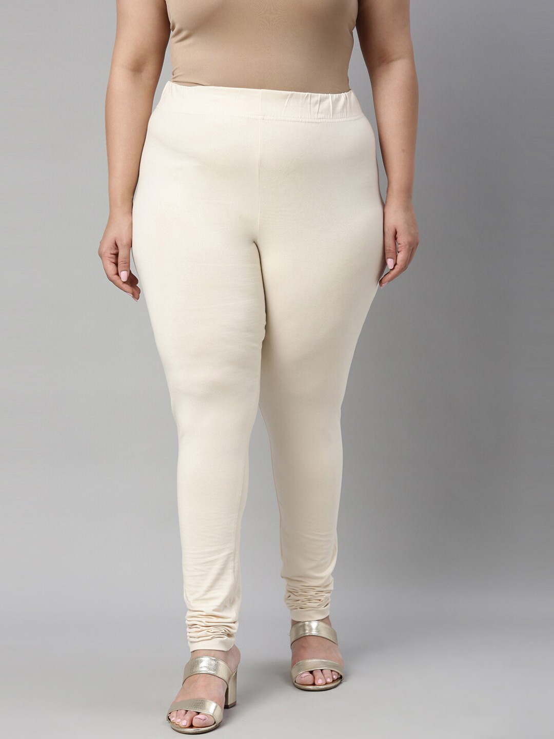 

Go Colors Women Cream-Coloured Solid Cotton Churidar-Length Leggings