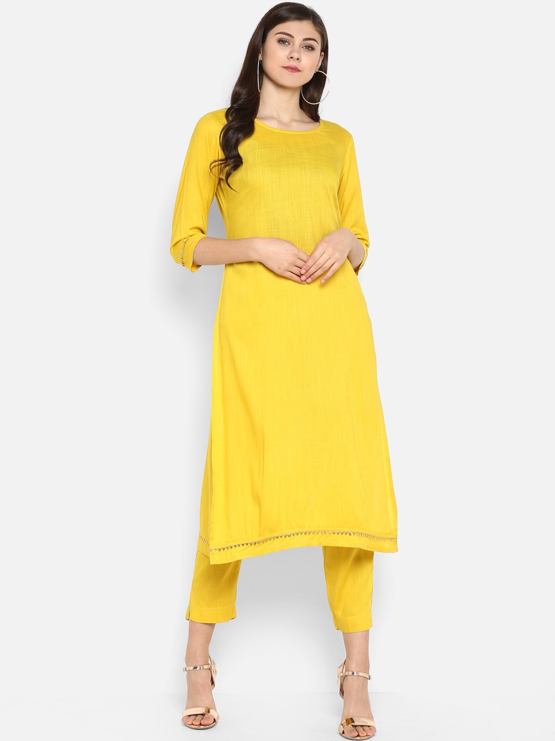 

Janasya Women Yellow Solid Straight Kurta With Trousers