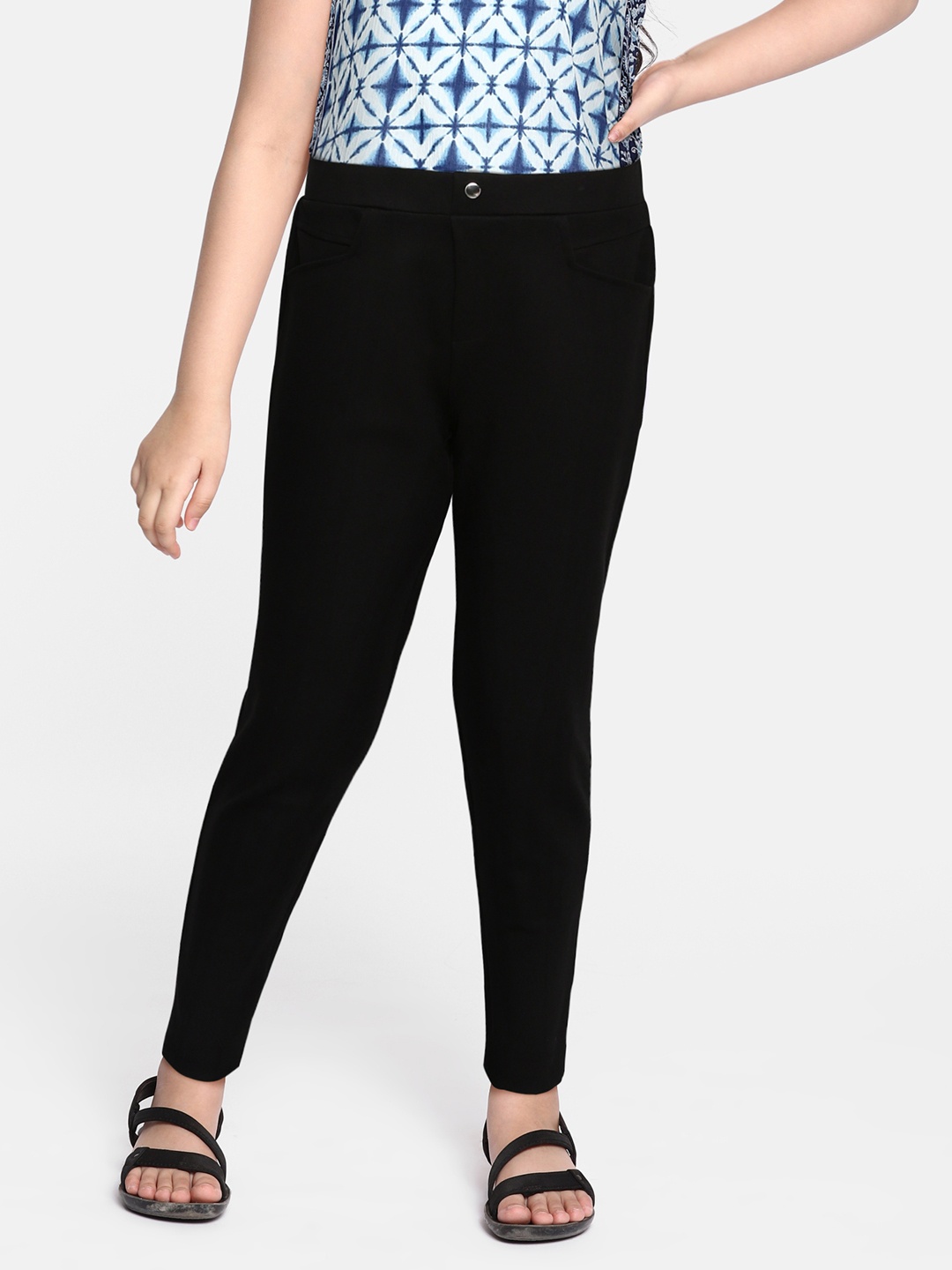 

Global Desi Girls Black Solid Skinny Fit Trousers