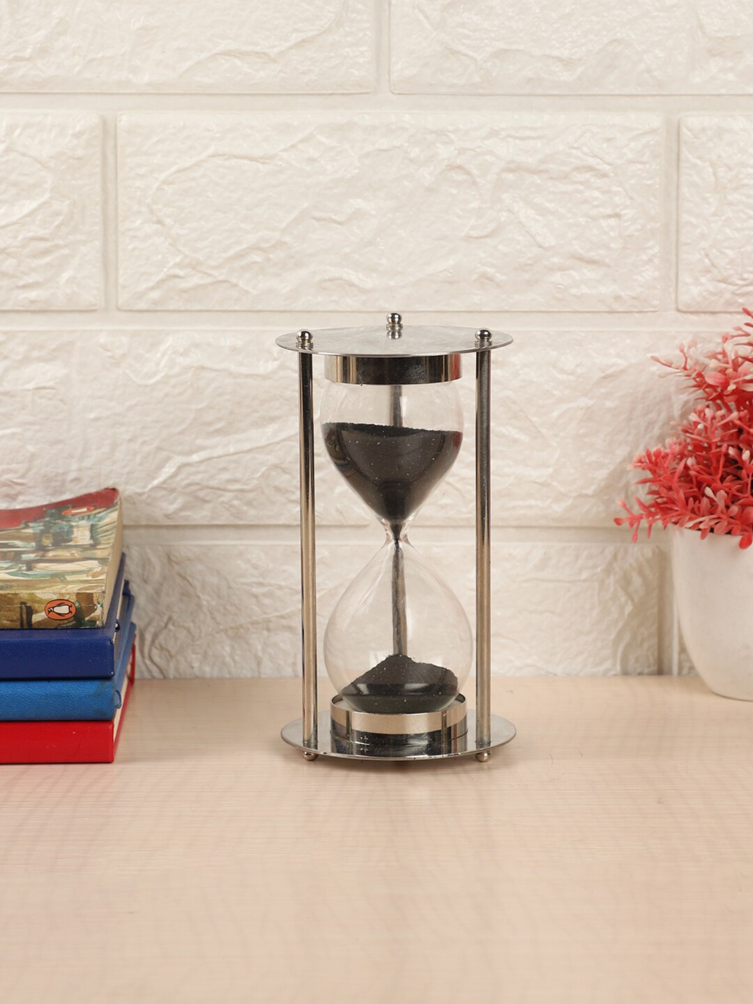 

EXIM DECOR Silver-Toned & Transparent Brass Sand Timer Showpiece