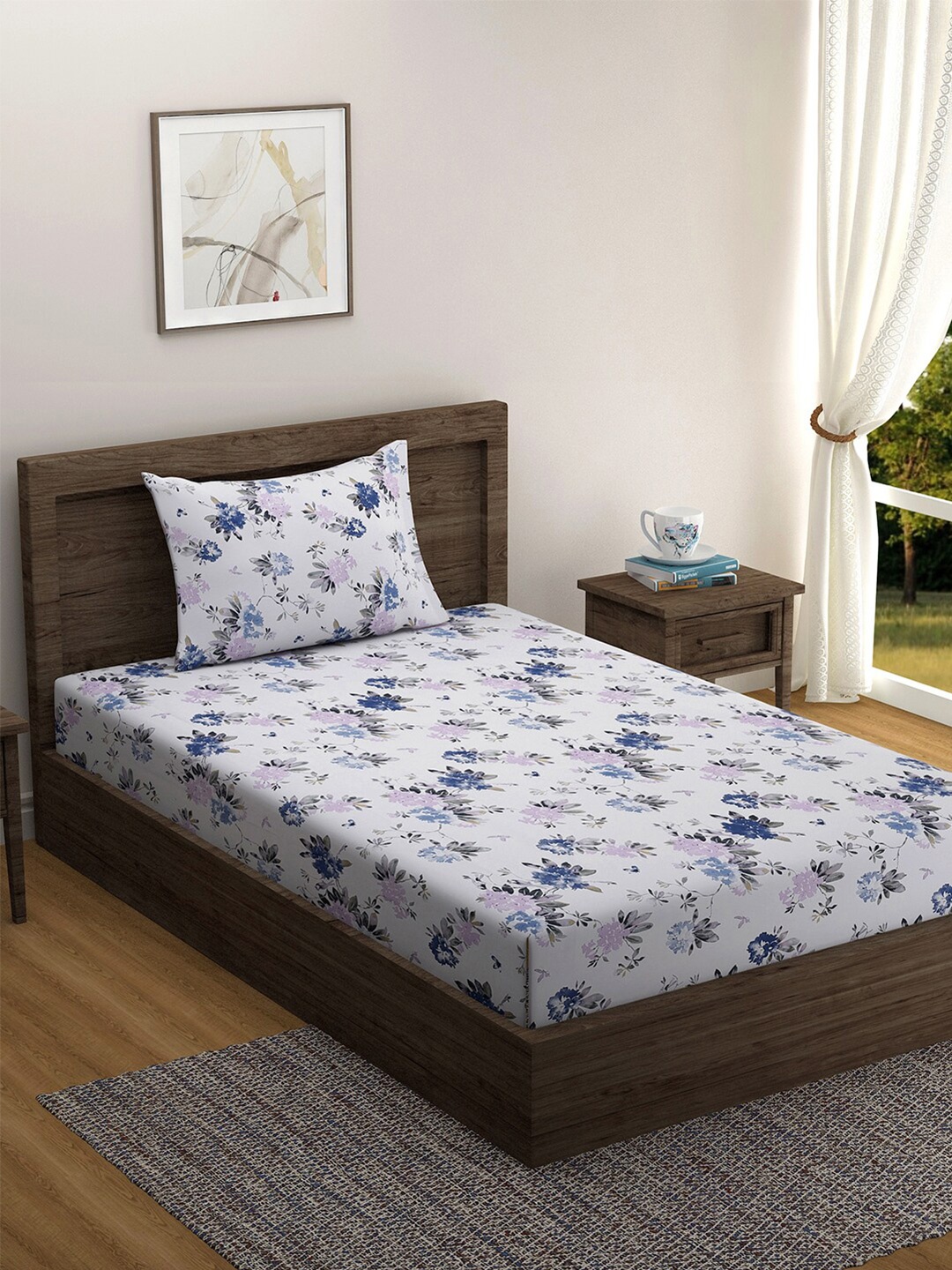 

Swayam Blue 210TC Pure Cotton Floral Single Bedsheet Set With 1 Pillow Cover, White