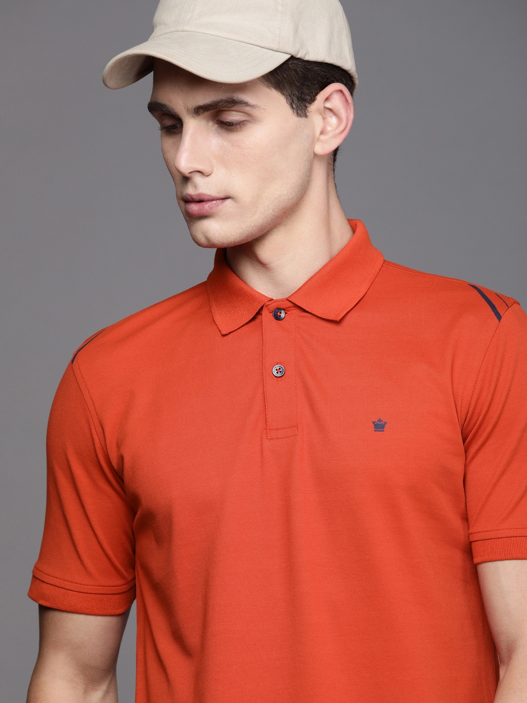 

Louis Philippe Men Orange Polo Collar T-shirt