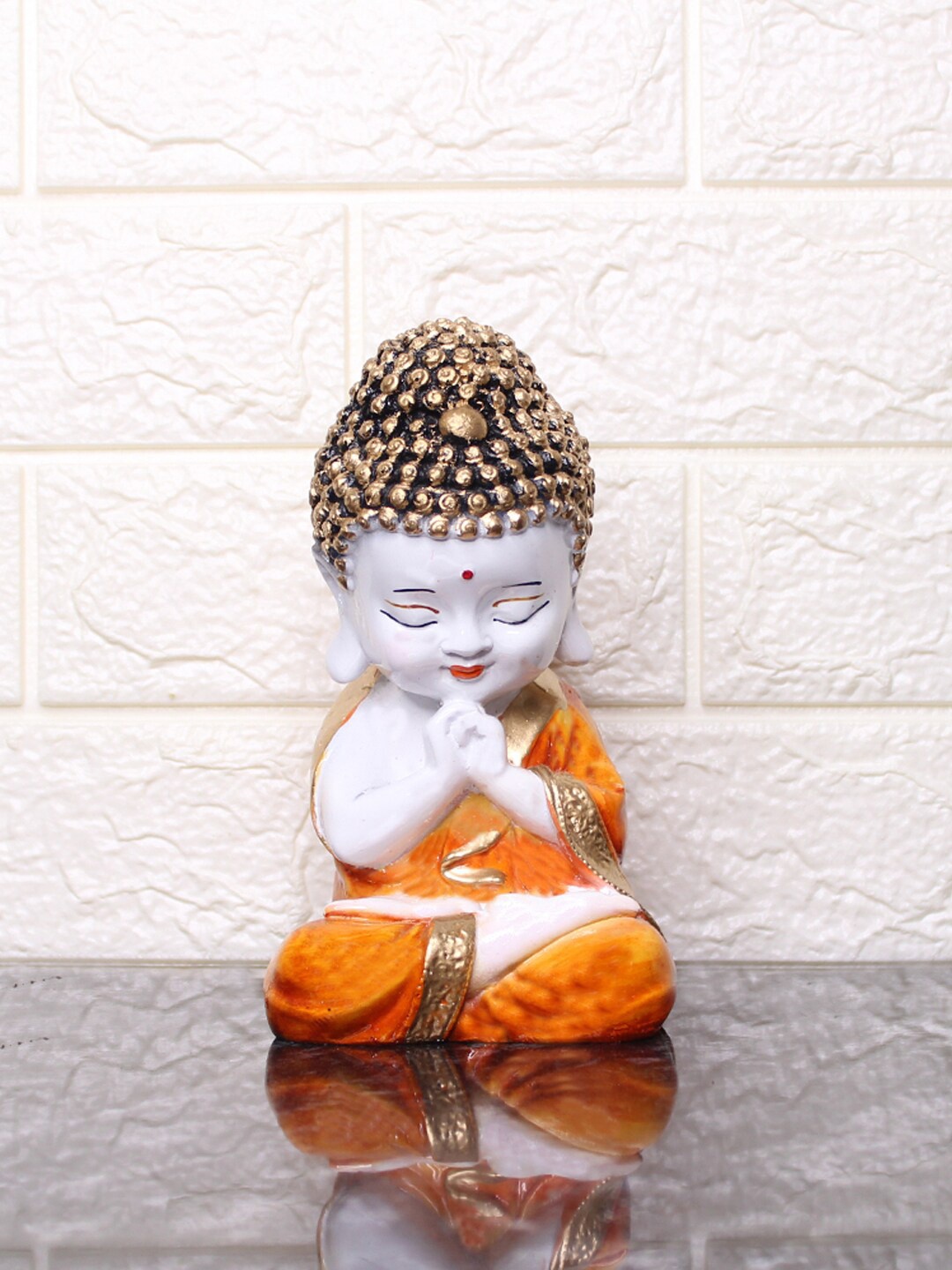 

Wonderland Orange & White Resin Buddha Showpiece