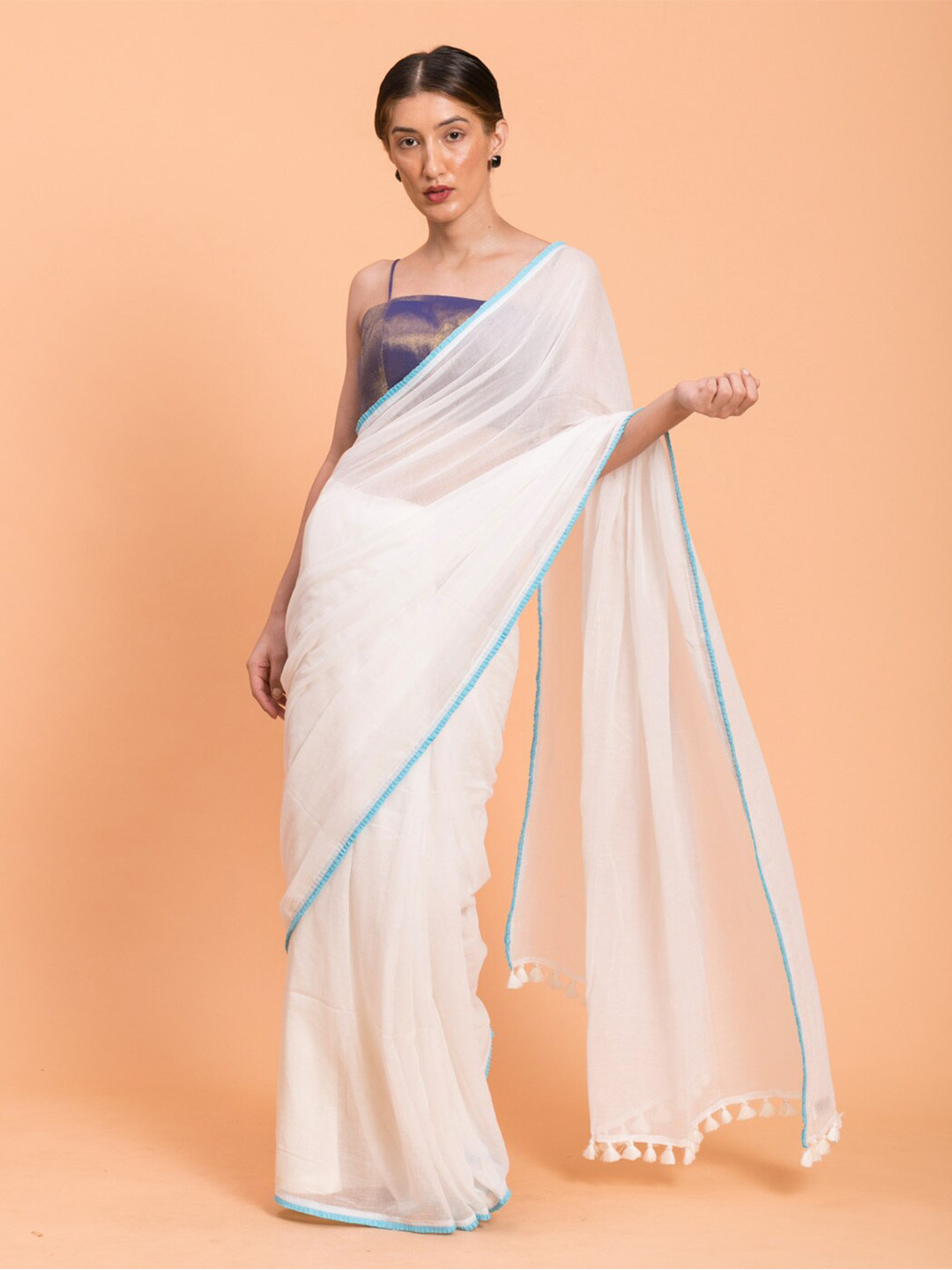 

Suta White Blue Solid Cotton Saree