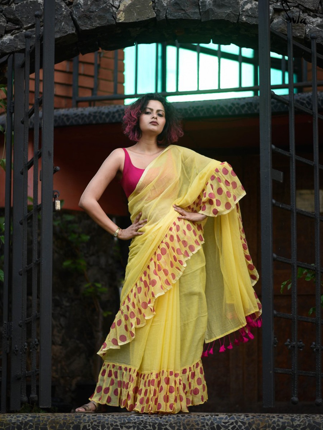 

Suta Yellow Pure Cotton Saree with Polka Printed Ruffle Border